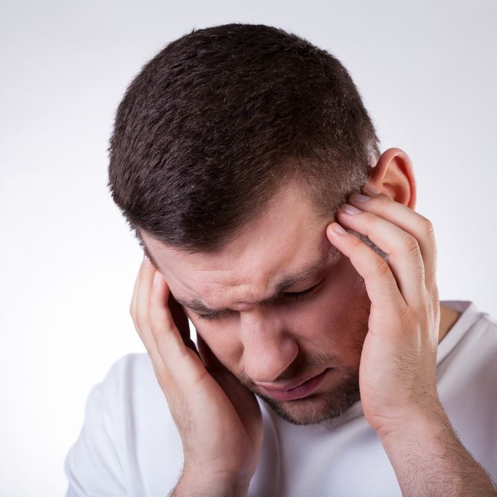 Man with Migraine Symptoms